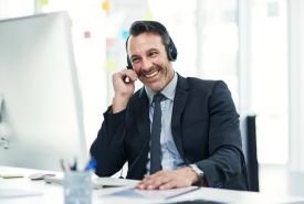 Professional in a video call with laptop, real-time sales support